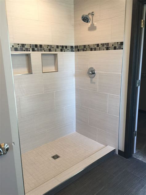 shower tile ideas 12x24|Shower Designs Featuring Large Format Tiles 